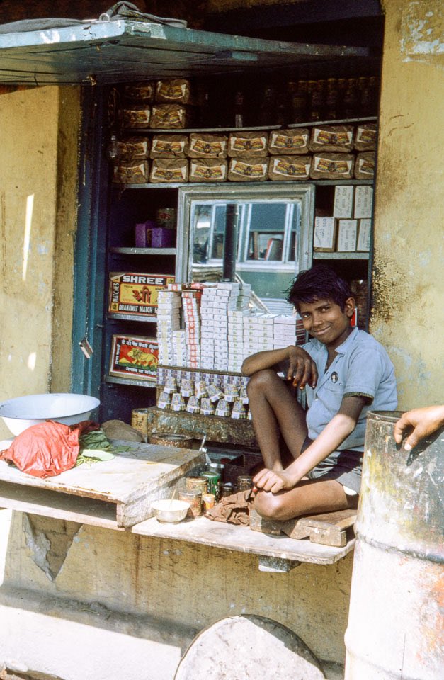 archiveofnepal's tweet photo. 1969-1971 Biratnagar, Morang: Boy street vendor in Biratnagar, selling bidis and cigarettes.

Photographer: Bob Nichols | #peacecorpsnepal

Explore: https://t.co/MRy8cvWPiT

#archives #history #archivenepal #nepalheritage #nepalihistory #digitization #nepal #oldphotonepal https://t.co/koE9NZqCTD