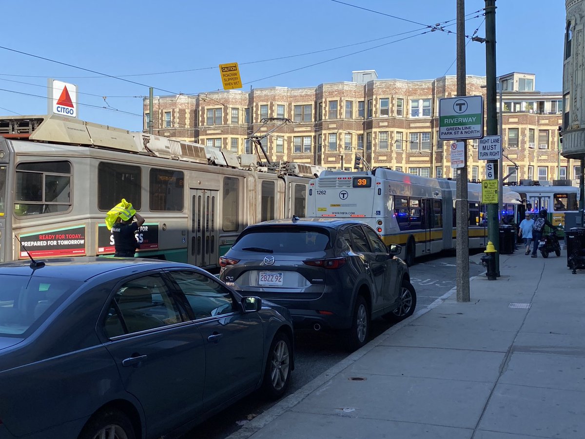 DenzilMohammed's tweet photo. A 39 bus hit an E line trolley at the corner of Huntington and S Huntington and the T is at a standstill. Great work @mbta. Transit cops are everywhere but getting nothing done. https://t.co/3RrvDxX612