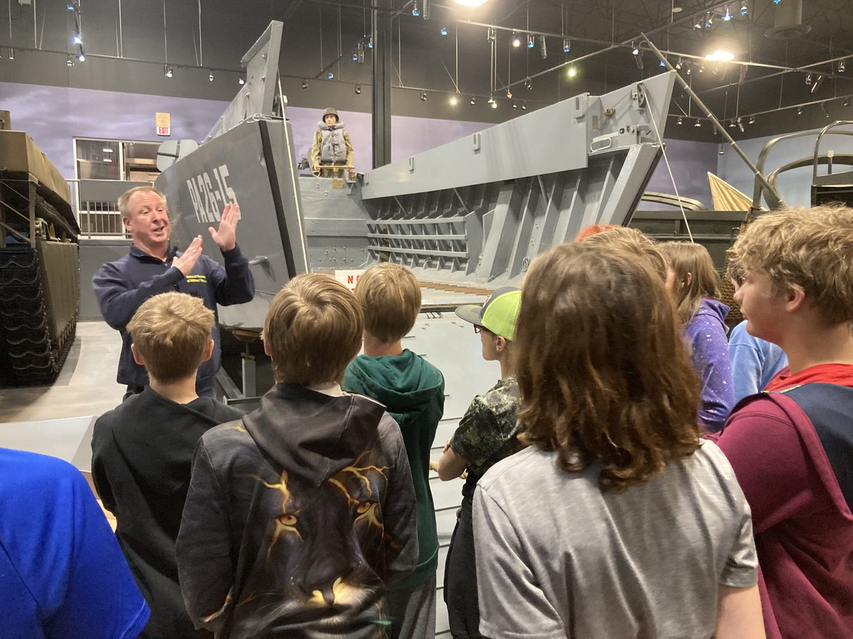 LMS_AP22's tweet photo. LMS 6th graders visited with museum curator Rae Whitley of the Dubois Museum of Military Vehicles about the United States' involvement in World War II.  Our students loved their professional exhibit displays and incredible war stories of bravery and sacrifice! https://t.co/BcvPZB1OHA