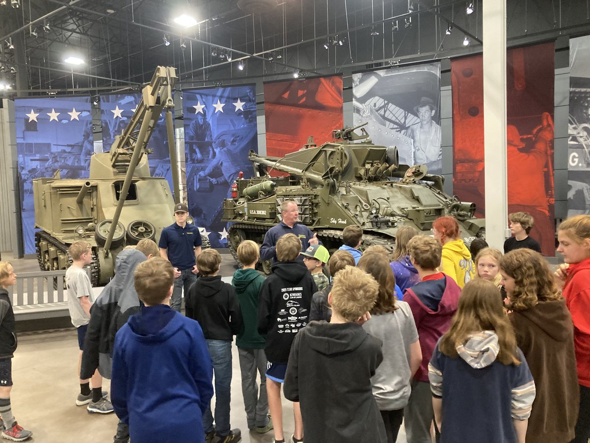 LMS_AP22's tweet photo. LMS 6th graders visited with museum curator Rae Whitley of the Dubois Museum of Military Vehicles about the United States' involvement in World War II.  Our students loved their professional exhibit displays and incredible war stories of bravery and sacrifice! https://t.co/BcvPZB1OHA