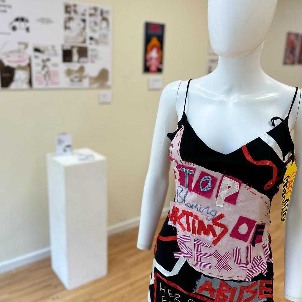 KnowViolenceAW's tweet photo. #TBT to our art exhibition with @AngliaRuskin! Did you catch us on the news? 
 
Our pop-up shop showcased the work of fourteen ARU Illustration students and their artistic depictions of violence against women. https://t.co/ceC8ZucVkq