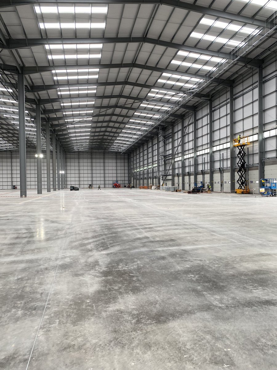 Our team of over 50 skilled operatives worked tirelessly around the clock to pour over 4000m2 of concrete on some days, completing the 270,000 sq ft warehouse project in just 10 days! 💪

#team #project #warehouse #concrete