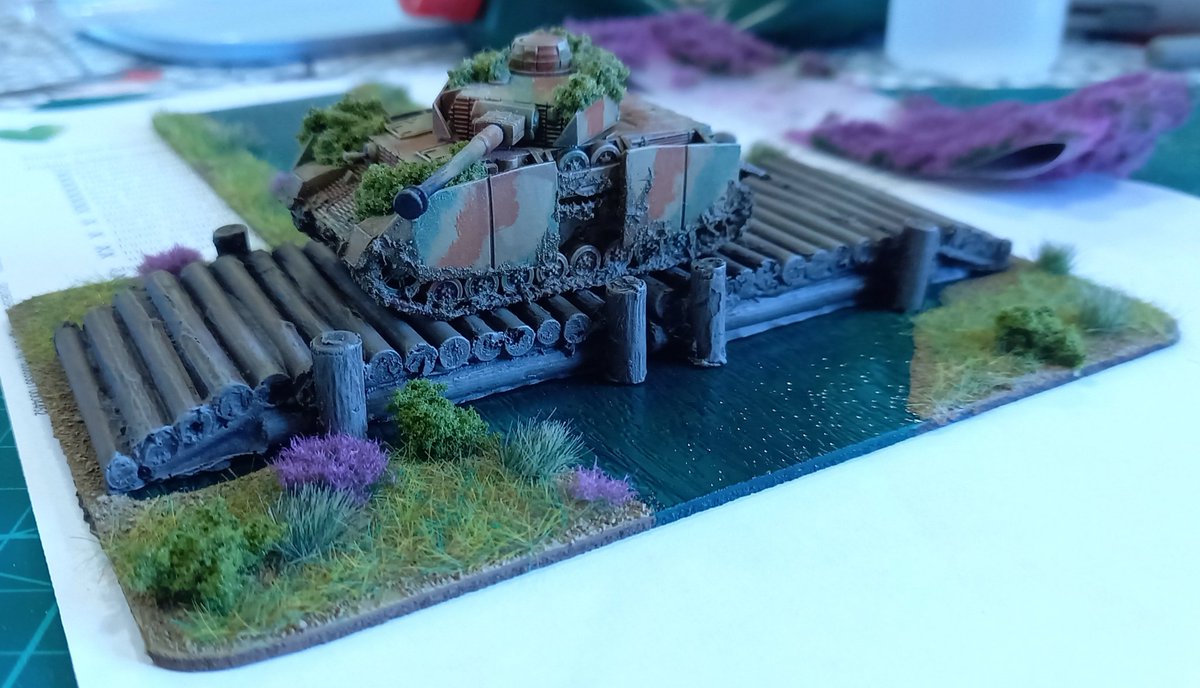 PlasticRapt's tweet photo. 15mm Scale Panzer IV for Chain of Command. I made 4' of river sections, including this bridge section, over the weekend. The bridge is a resin piece I picked up on eBay a couple of years ago. I'm currently re-visiting &amp; re-working my 15mm terrain. #toofatlardies #wargames https://t.co/C2fXjBQ9DV