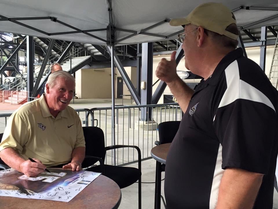 My contribution to #ThrowbackChallenge on #UCFDayofGiving is the time my hubby Chip tried to coach Coach O’Leary at FanFest 😝.  If I win the $1000 I will donate it to @UCF_Softball