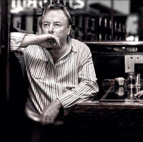 OutlawsPoetic's tweet photo. The great Christopher Hitchens born on this day in 1949. 

“The gods that we've made are exactly the gods you'd expect to be made by a species that's about half a chromosome away from being chimpanzee.”

￼ https://t.co/rJbVy7Z9lt