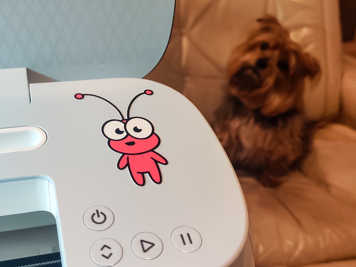 TammyLynn_17's tweet image. I made another thing! This is a #CricutCutie, the #Cricut mascot. I think it's supposed to be green, but I wanted a pink one. This is my first attempt at three colour/layer permanent #VinylDecals. It's not perfect, but it's mine. 😊 And it's now stuck to my machine. 🤷🏼‍♀️🫣🥰