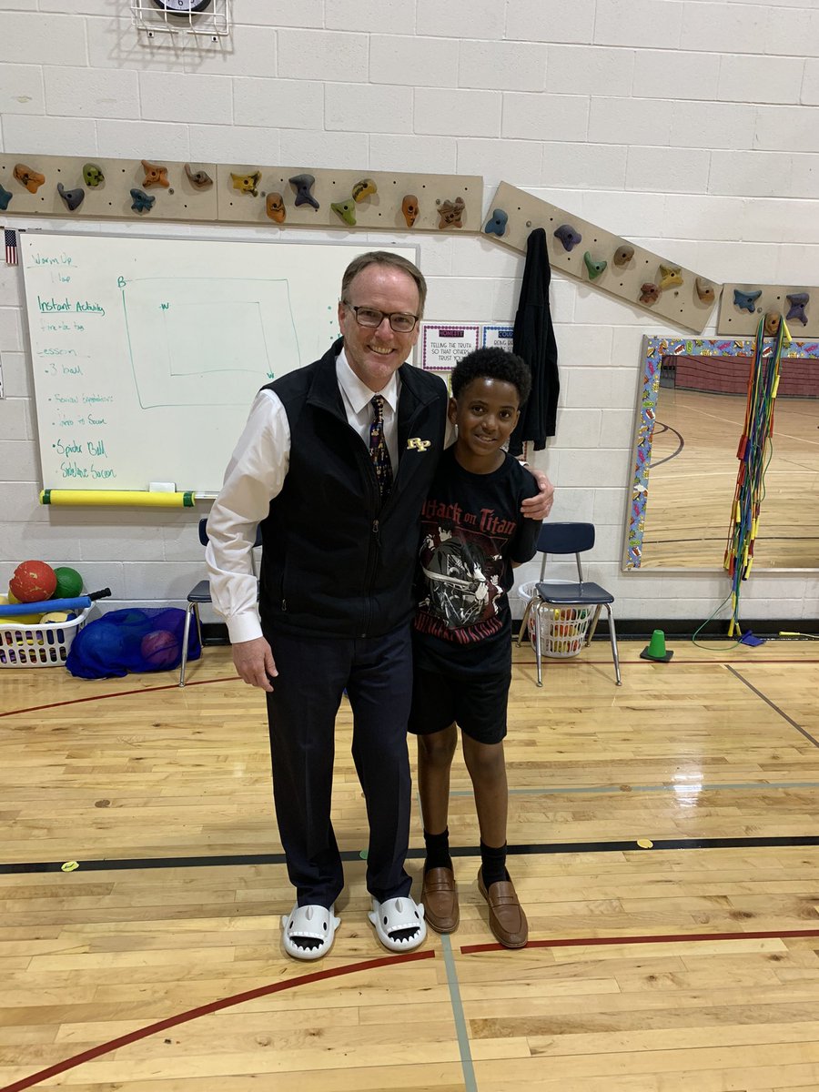raypecschools's tweet photo. Superintendent Dr. Mike Slagle traded shoes with 5th grader Keon for a bit today at Timber Creek Elementary School. Dr. Slagle said he loved Keonβs shark look! @TCEJaguars #raypec #forwardandbetter https://t.co/MUfT2pJLSk