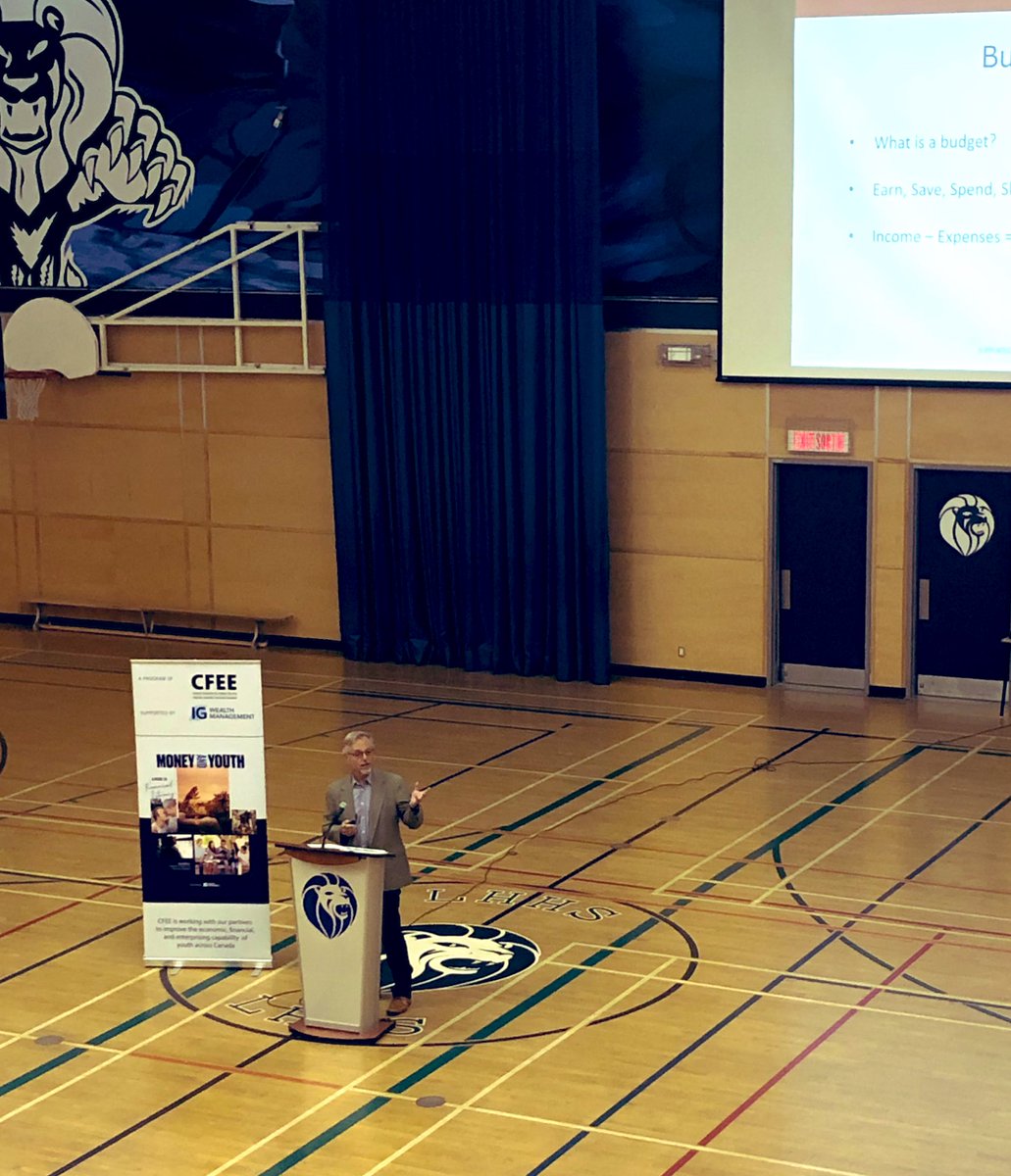 prosequence's tweet image. Kevin from @_CFEE engaging grads of Leo Hayes with financial literacy. Parent session to follow at 5 today 😊