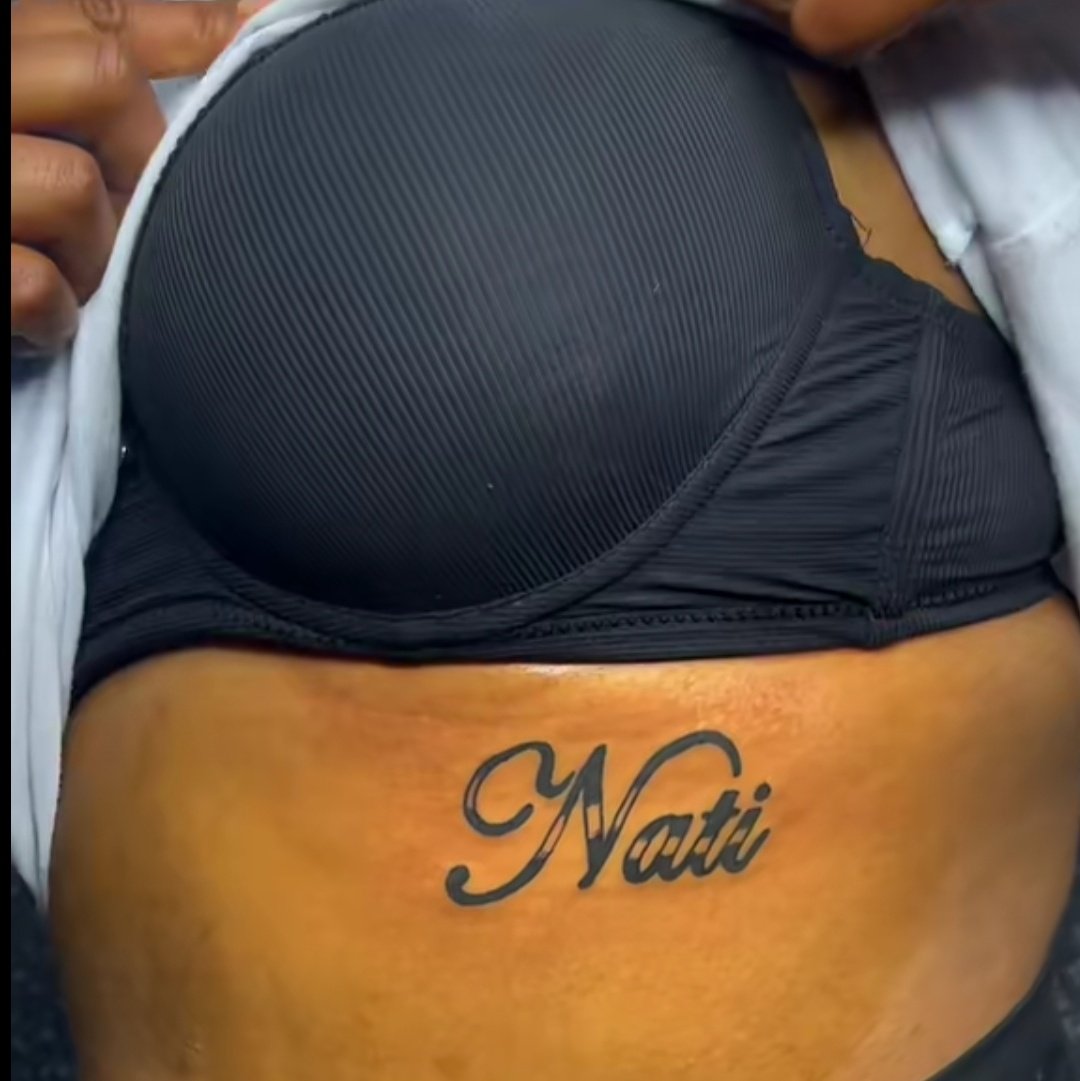 Beautiful Boyfriend Name Tattoos Under the Breast
