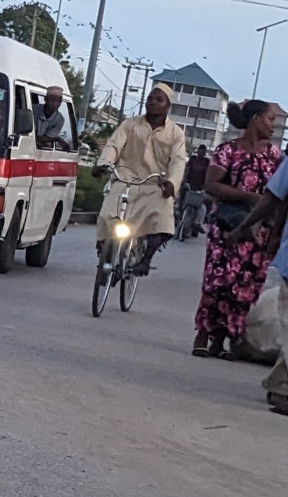 DontjeJames's tweet photo. #30DaysofBiking Dusk in Tanga during Ramadan.  This Muslim man is probably pedaling home to break the fast. https://t.co/XiGGAhy0z8