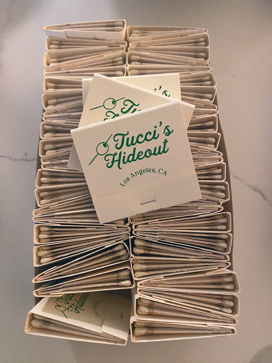 caitiedelaney's tweet image. oh what so now I’m the weird one because I designed custom matchbooks for my house advertising a fake cocktail bar that my dog owns