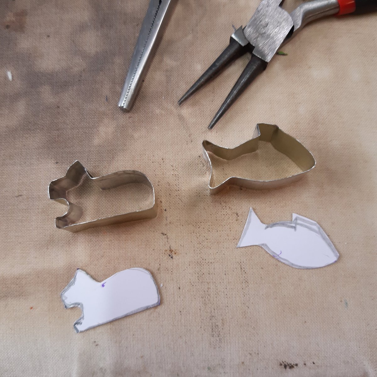 A whole load of end bits cut for the  bookmarks, made with the new cutters I've made.