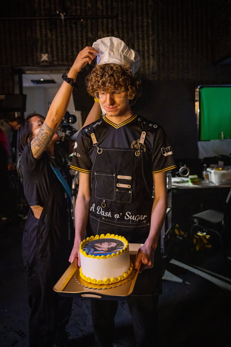 frenzystudiocc's tweet photo. A few Production Design details from the LCS "Dash is BACK" shoot! Custom Dash fan shirts and signs, Licorice baker apron &amp; Dash "Pog" cakes, wall of Dash photos, MVP crown, gold stage flats and a lot of balloons. 
📷by @ShannonCottrell https://t.co/TZUhqUQcb9