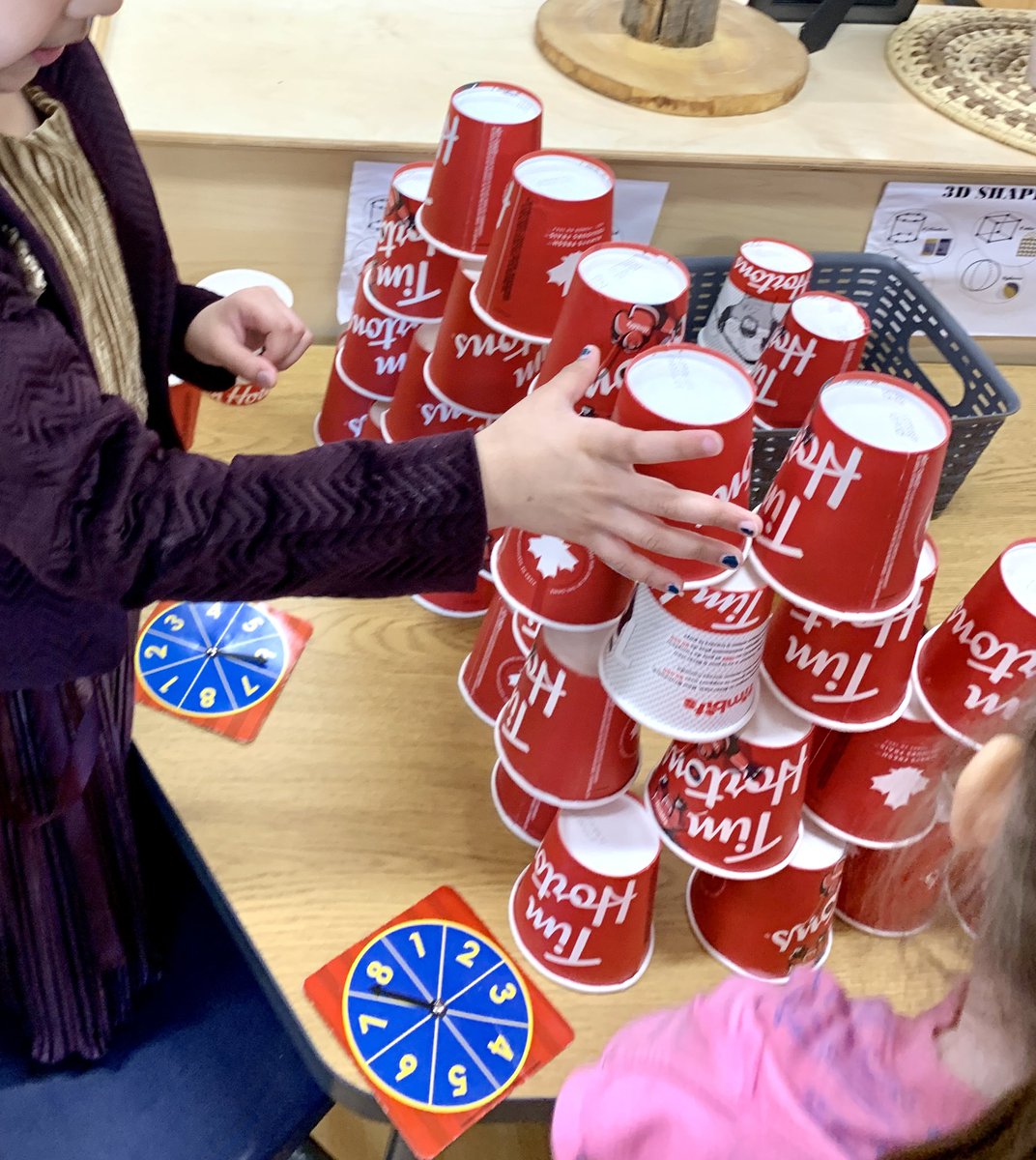 Students used spinners to determine how many cups to their towers. <a href="/oakwrdsb/">Oak Creek PS</a>