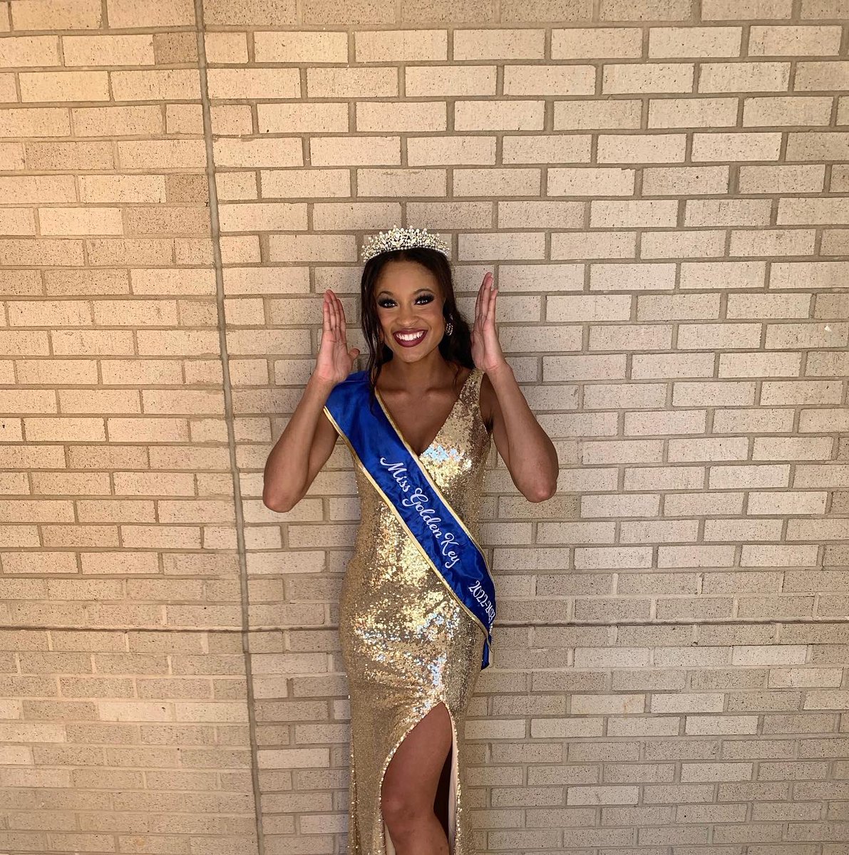 Here you can see me wearing my my official crown and sash as the South Carolina State University’s Miss Golden Key International Honors Society 2022-2023. 
As Miss Golden Key I am within the top 15% of my graduating class, while also being heavily involved in my campus community