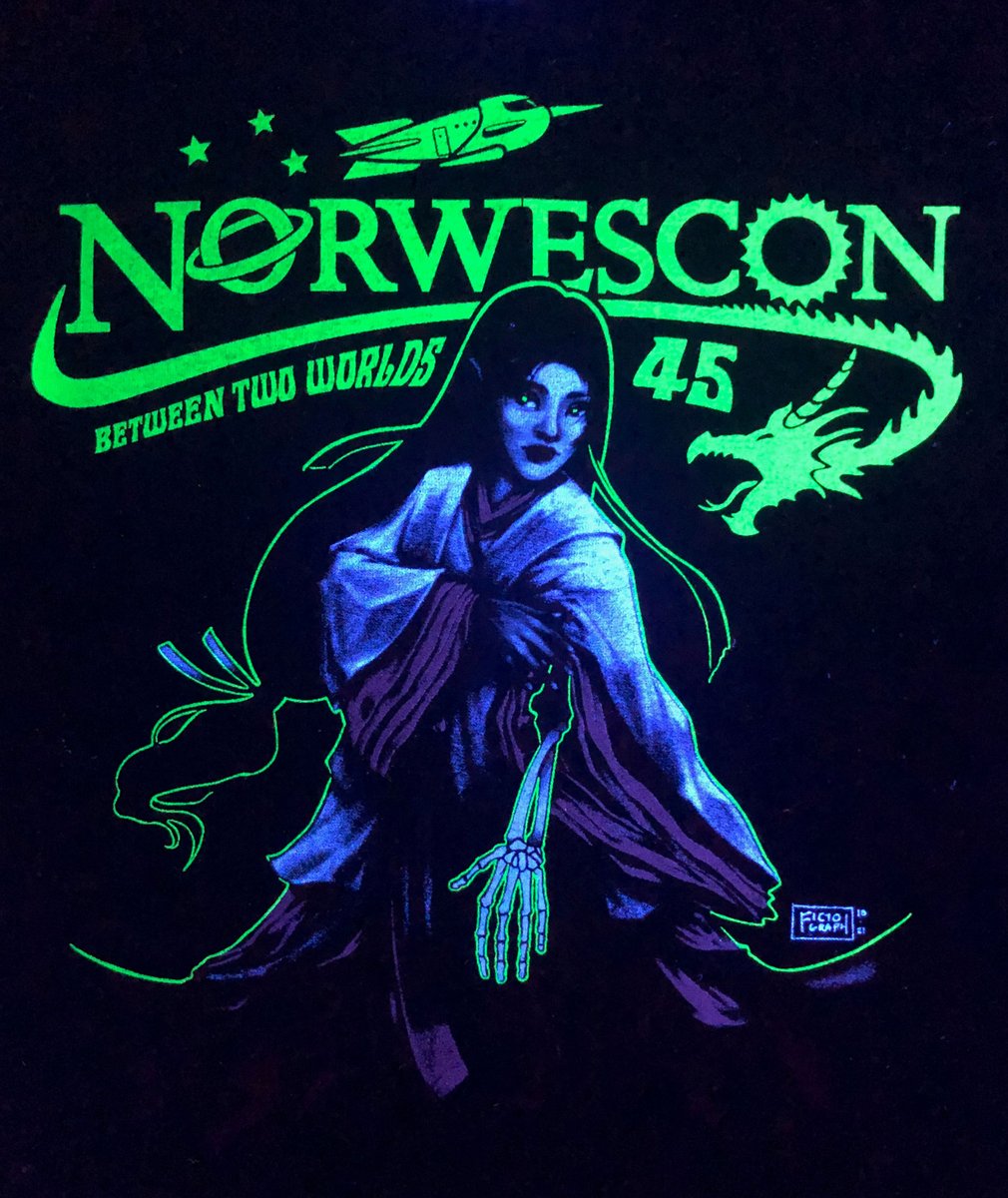 ArkhamBazaar's tweet photo. If you missed getting this year's Norwescon T-shirt in the dealer room, or weren't able to attend, but love the art by @fictograph , head over to https://t.co/eHge8qprsT and get you one! (they glow under uv light!) #norwescon45 https://t.co/ssgCIczo1X