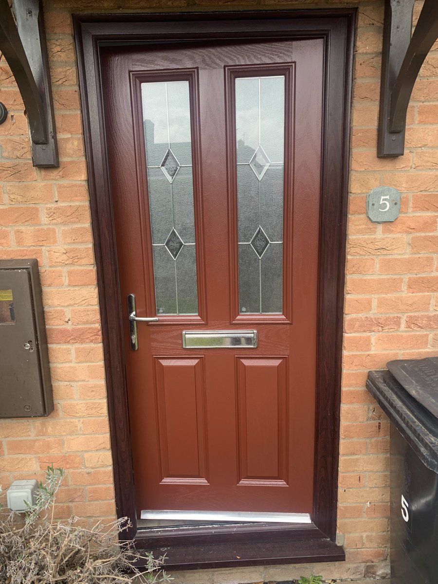 Badly faded composite door had the Stamford Upvc Spraying treatment today