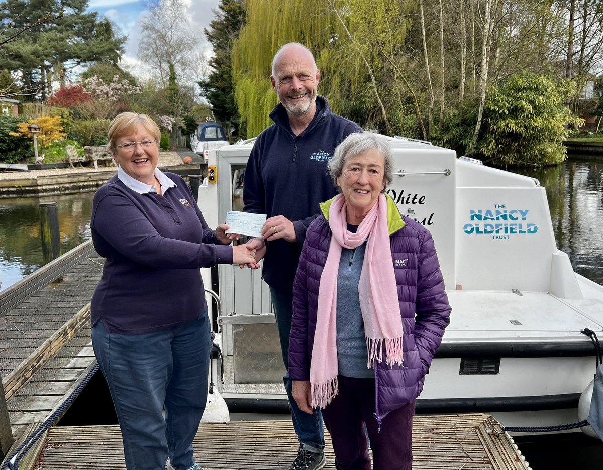 Our Skipper, Liz, and Charity Organiser, Lesley, present a cheque to <a href="/NancyOldfield/">Nancy Oldfield Trust</a>