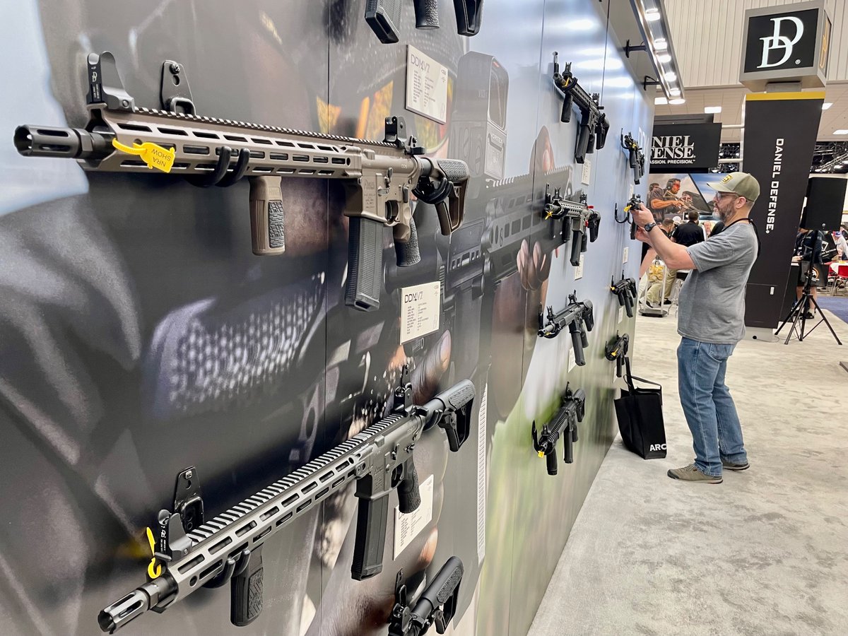 AlexandraUlmer's tweet photo. The manufacturer of a rifle used in the Uvalde school massacre skipped last year’s NRA convention, which took place days after the shooting. 

This year, Daniel Defense is back in full force, with big booth &amp; sponsoring the event. They declined to talk to me. https://t.co/UtHoWucqed
