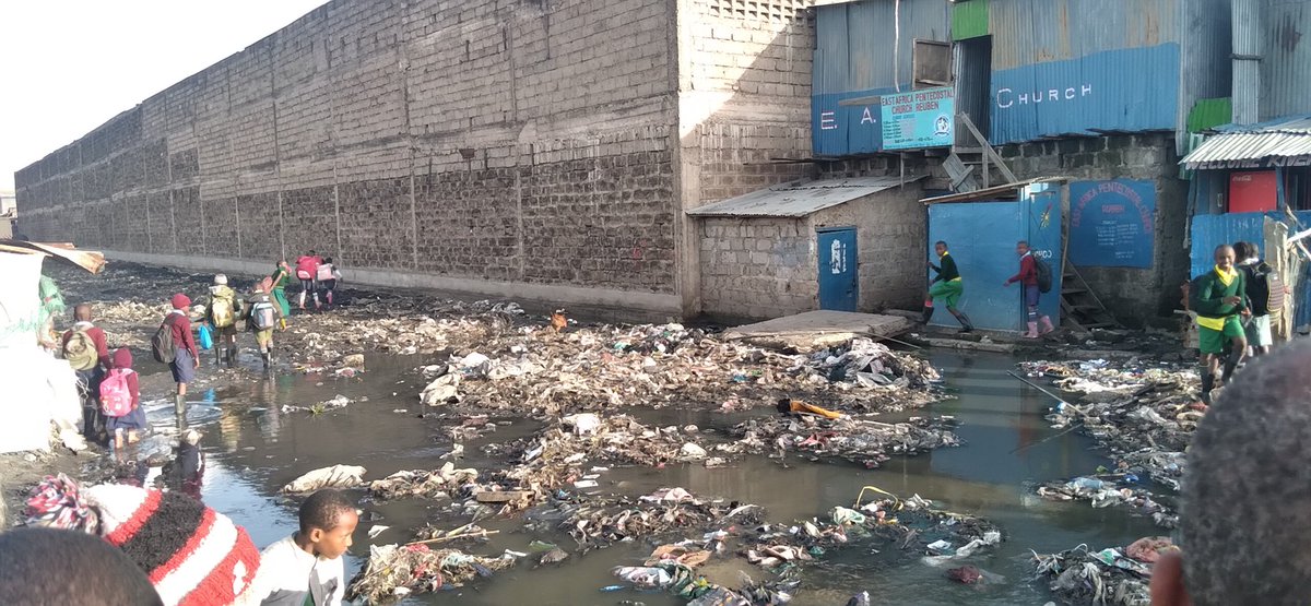 MukuruSPA's tweet photo. Residents of Mukuru Kwa Reuben deserve better. This road is always on every financial year. @SakajaJohnson think about these school going children. Think about their education &amp; health. If the rains continue,they will miss school and are prone to waterborne diseases. Lazima iWork https://t.co/fZe1wzLxJM