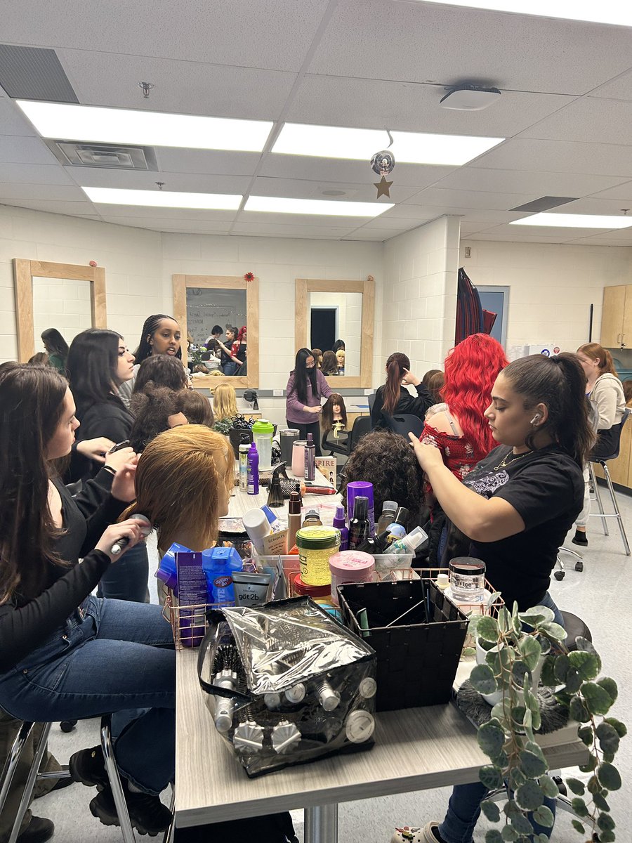 mlle_reeves's tweet photo. The hairstyling class at @HolyTrinityOCSB had a Trinity Alum Marissa Donnelly in yesterday!!! She brought a model with her too!! We were so excited to learn from her about how to properly cut hair &amp; style techniques 🤩 https://t.co/AJjWLfH0lz