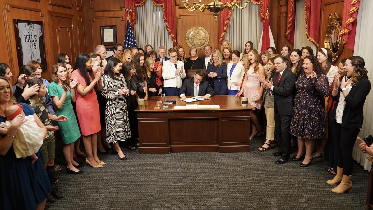 LifeNewsHQ's tweet photo. Florida Governor Ron DeSantis signs the bill to ban abortions on babies with beating hearts.

Virtually all women in attendance.

https://t.co/5oGBMRcn0t https://t.co/jASy3DPC1Q