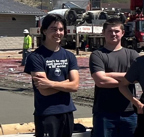 PrayConCo's tweet photo. On Day 2 of our concrete pour at the Nitro Athletic Complex, Pray Construction's President Mark Grigsby had a teaching moment with the pre-engineering students of Nitro High School...  Proving that concrete is cool! https://t.co/t6HzlQTmPq