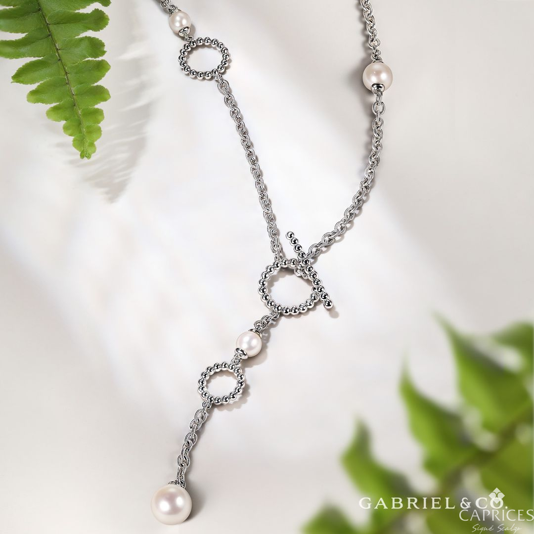 Pearls and silver come together in a modern twist of contemporary elegance. Make a statement with Gabriel&amp;Co necklace, available at Caprices Signé Scalzo. Come and see it for yourself. ✨
 ✨