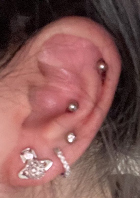 GRRRRAAHH i love my new piercings