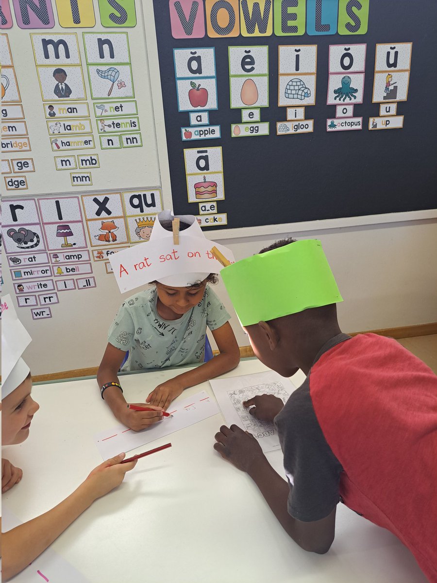 becia1978's tweet image. &apos;Learning to write sentences can be fun!&apos;Grade 2 students used cool activities to improve reading and writing skills with younger students. #learningAtWis #readingskills #funlearning #grade2