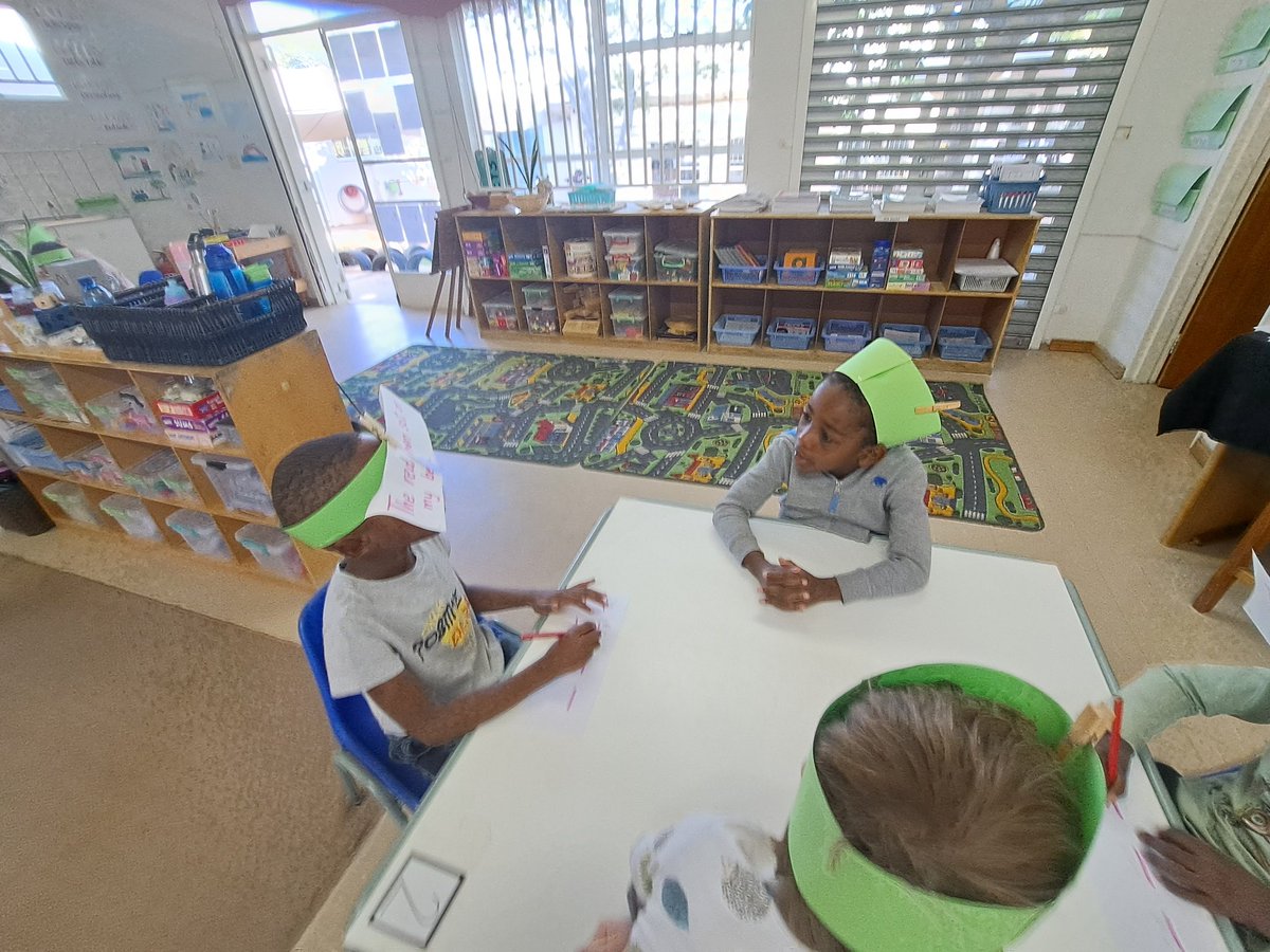 becia1978's tweet image. &apos;Learning to write sentences can be fun!&apos;Grade 2 students used cool activities to improve reading and writing skills with younger students. #learningAtWis #readingskills #funlearning #grade2