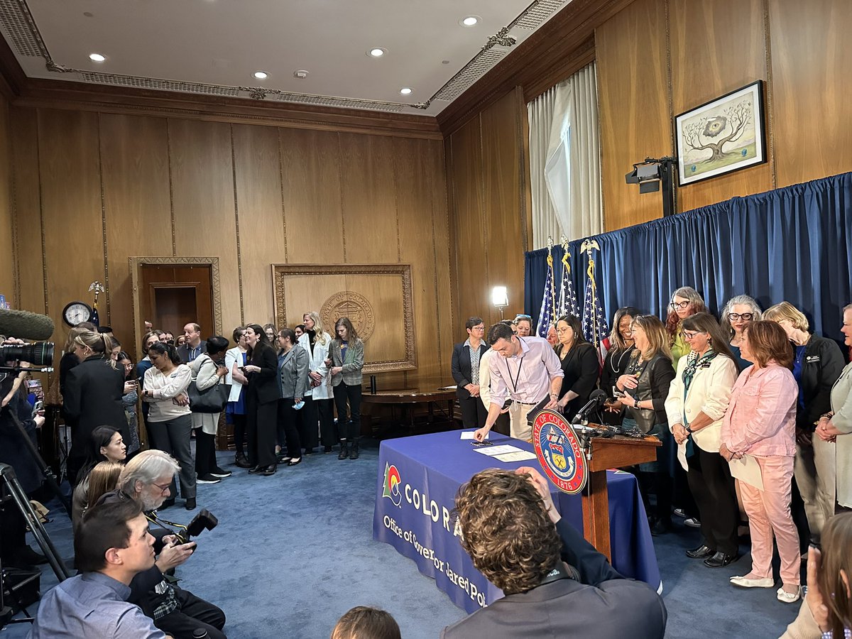BySajaHindi's tweet photo. Lots (yes, that’s scientific) of people gathered at @GovofCO’s office this afternoon for abortion and gender-affirming care bills signing. https://t.co/PUHa7Ie7pI