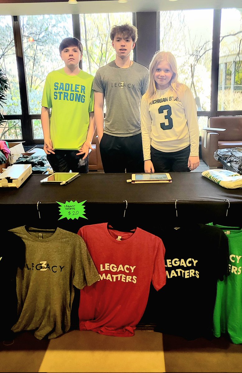spartykids's tweet photo. If you need a styling Sadler Shirt, here are your volunteer sales force at today's @Sadler_3 Legacy Conference at the Kellogg Center! 
#sadlerstrong #sadler3aroundtheworld https://t.co/i9jLZZrWyM