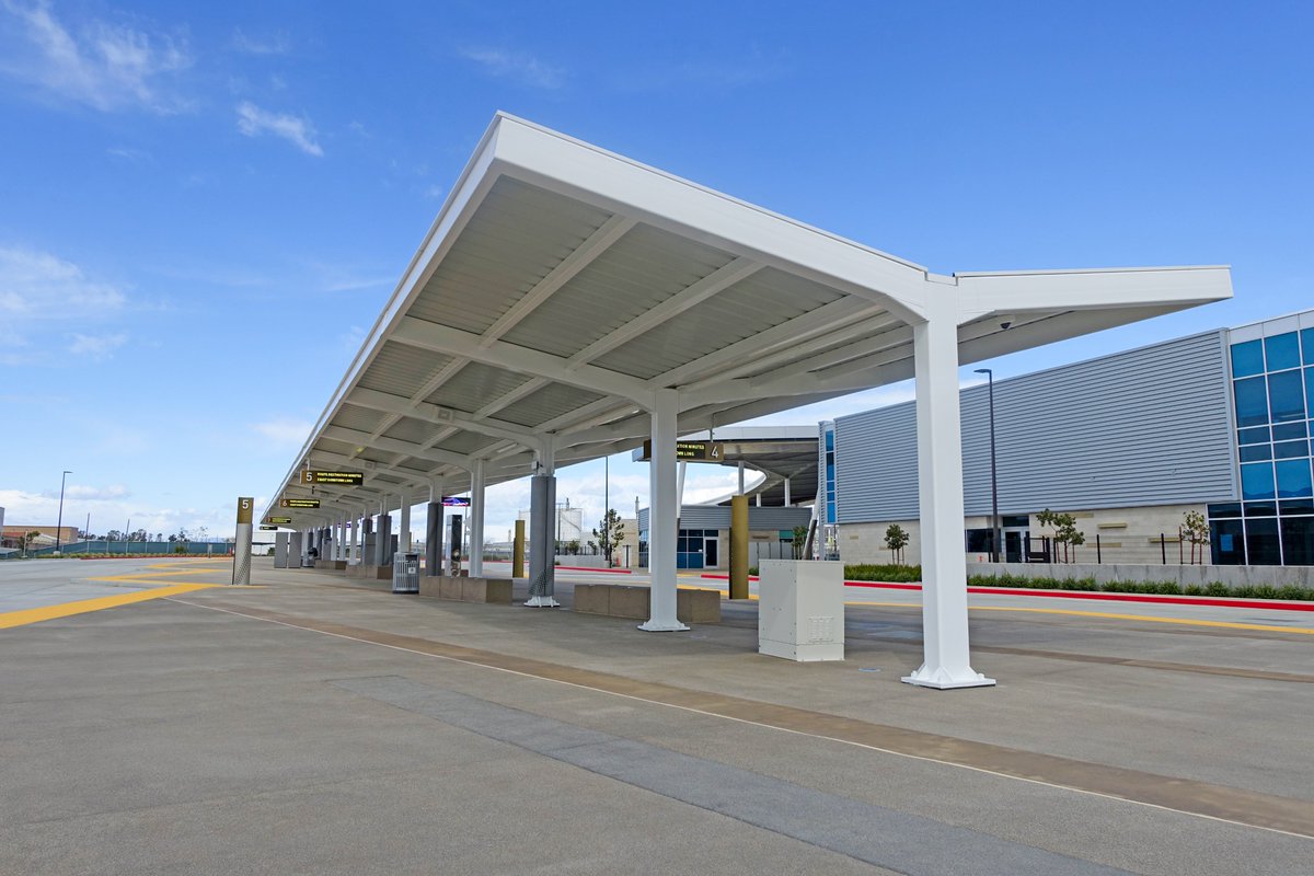 Poligon gullwing structures provide maximum coverage with minimal column interference. Their upward angled roof diverts water and provides higher clearance  making them the ideal structure for transit areas. 

#gullwing #transitshelter #walkwaycanopy #bustop #transportation