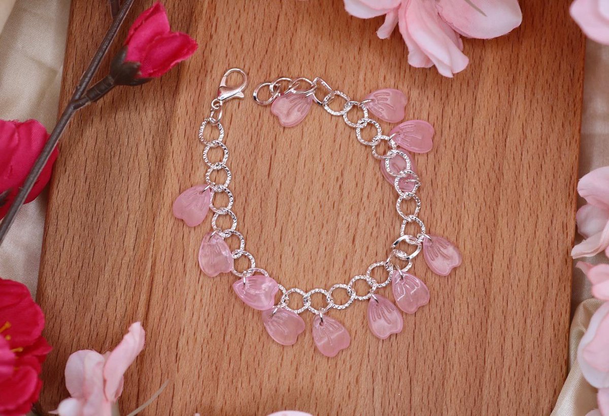 I’m OBSESSED with these cherry blossom bracelets