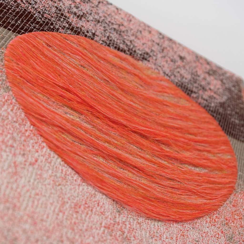 Shelley Socolofsky takes landscape art to a new level in her tapestries, replacing natural scenery with surveillance images taken by aerial drones of areas affected by #climatechange. ⁠
⁠
Pictured is her 2022 tapestry "Blood Moon over Arctic Shelf Melt (Lunar Double)"