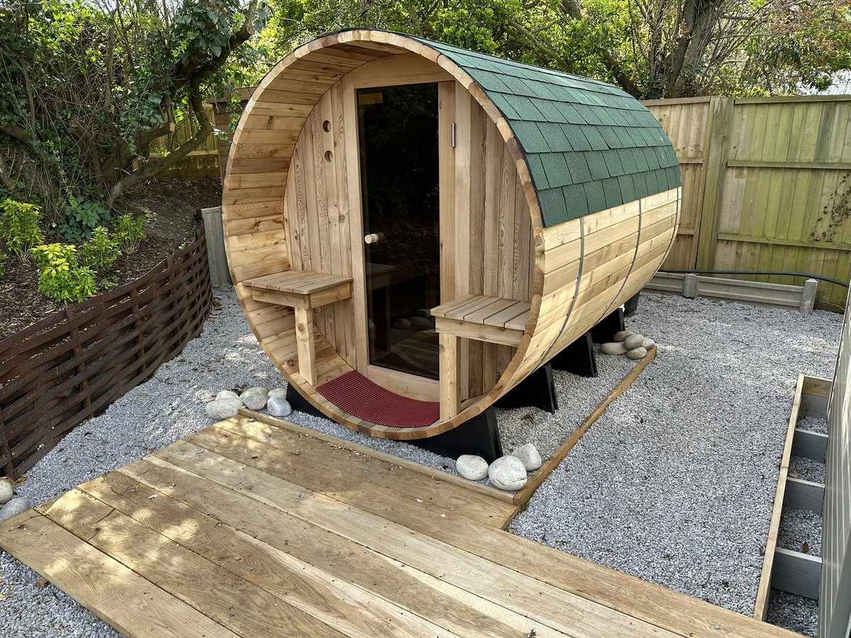 WensumPools's tweet photo. B A R R E L  S A U N A

.. seats up to 6 and is a fantastic addition to the garden. The shingles add that extra touch of weather proofing and the porch is a perfect spot for a glass (or two!) of fizz 🥂Cheers!
#wensumpools #sauna #barrelsauna #makingmemories #norfolkpoolbuilders https://t.co/BRSqwttMfC