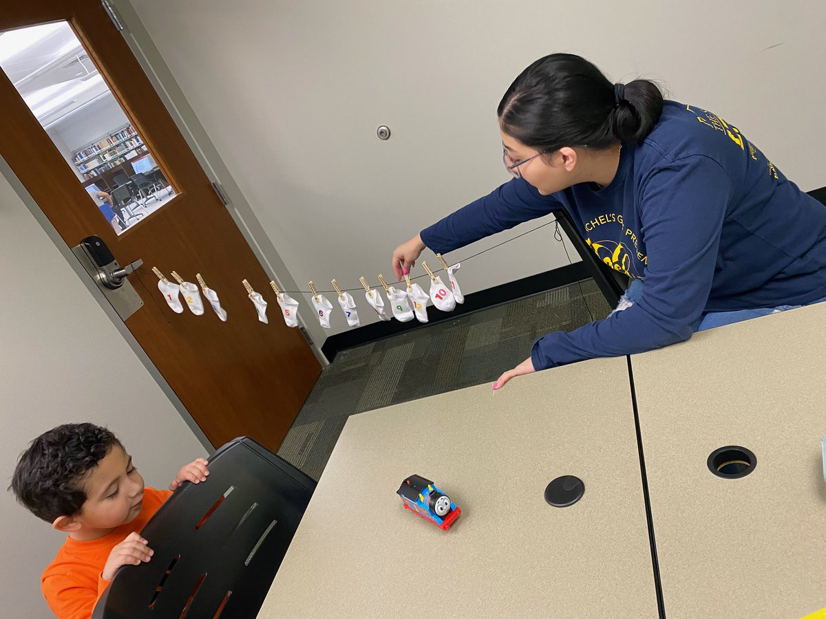 RCPS_EarlyLearn's tweet photo. During a Pat visit with Mrs. Gutierrez Student A works on fine motor skills, counting and matching while hanging out the wash. Mom reads a book as well during the visit.
#insectclassification #pat #dph #finemotor #count  #math #parentsasteachers https://t.co/32E8ixHZ9D