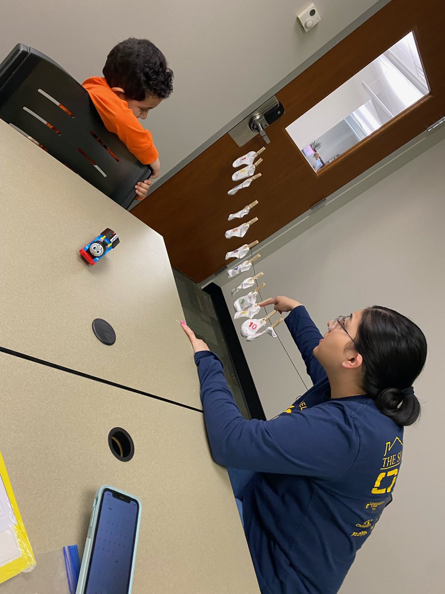 RCPS_EarlyLearn's tweet photo. During a Pat visit with Mrs. Gutierrez Student A works on fine motor skills, counting and matching while hanging out the wash. Mom reads a book as well during the visit.
#insectclassification #pat #dph #finemotor #count  #math #parentsasteachers https://t.co/32E8ixHZ9D