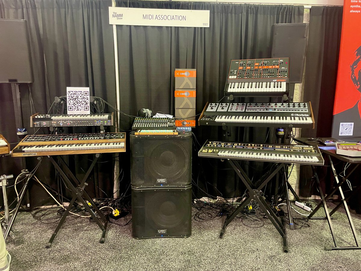 MIDI booth 2023 #NAMM features a Prophet connected to a Roland Jupiter echoing the very first public demonstration of MIDI which took place at NAMM 40 years ago this year. Dave Smith to be honored with a lifetime achievement award Saturday April 15th: midi.org/midi-articles/…