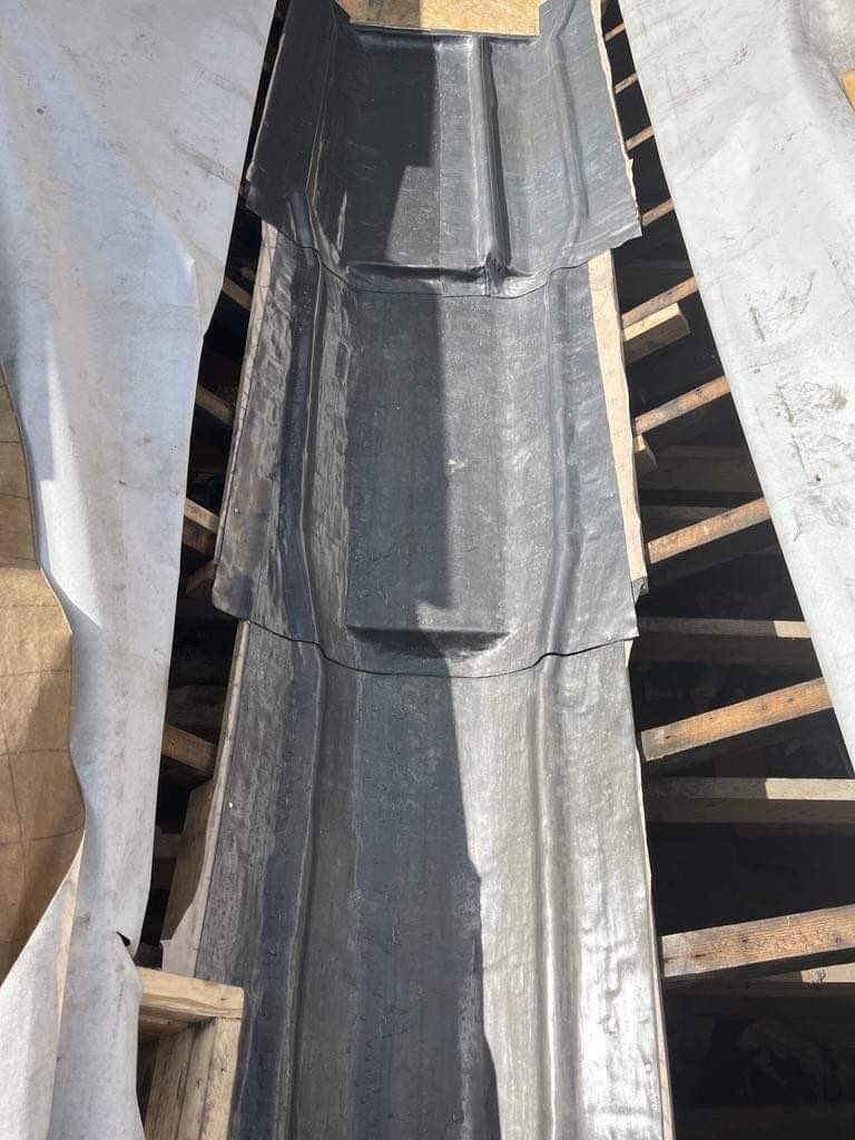 CliveFinlay1's tweet photo. Great work by our valued team on a new roof centre valley, (new structures and leading). #limerick #georgian. The replaced roof slates (non original) were asbestos. New natural slates being installed next week. Mallow Street #mallowstreet https://t.co/92CYUugw4p
