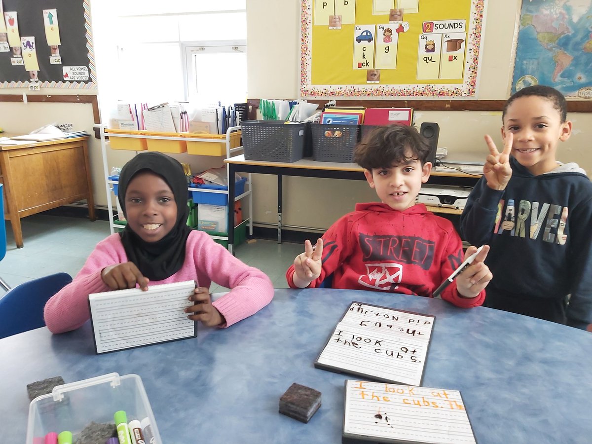 Msloncke's tweet photo. Students working on applying their phoneme awareness to writing sentences. We use capital letters, spaces and punctuation. @PrinceEdwardPS https://t.co/Io9Uu2HKTF