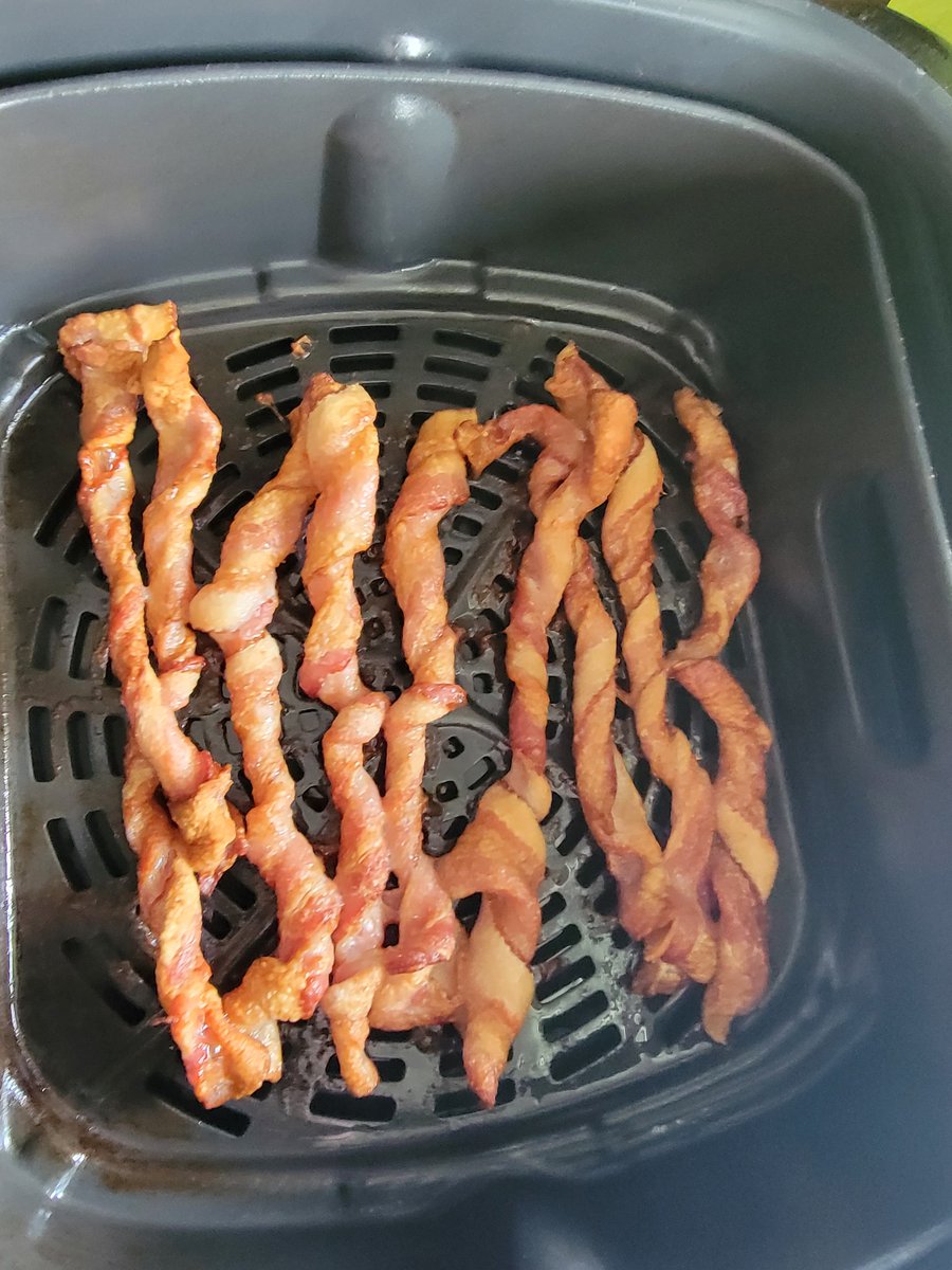 2_fists's tweet photo. Added bacon to my eggs and corned beef for the first time, and it was extra delicious. First time frying the bacon twists, and I was pleased that I could fry 2x the amount in the time it takes to fry flat.  Surprised how evenly they cook too. #keto #carnivore #protein #fat https://t.co/iH2DlERyBM