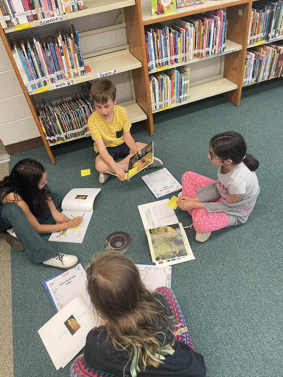 3rd graders actively engaged in book club discussions. I am impressed with these deep thinkers! #21learns