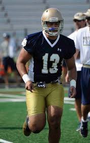 GhostsofStPaul's tweet photo. St Paul assistant coach Tyler Luatua during his playing days at the University of Notre Dame Fighting Irish 
God,Country ,St. Paul
#Brotherhood
#BeASwordsmen https://t.co/Hm8UNuZGis