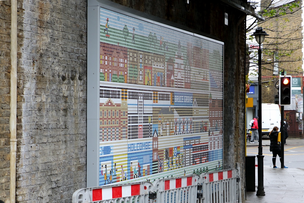 FurnerStephen's tweet photo. The Bruce Grove Bridge mosaic was installed today.  The designer Anna Nicolo says it ". . . celebrates the stories, places, people and rich history of Bruce Grove by having them all represented in an ideological map of the area . . ." @HaringeyCP @haringeycouncil @BBCLondonNews https://t.co/t0hRM5AQFg