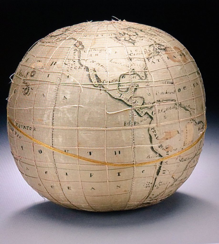 An embroidered globe made in 19thc US when girls were allowed to learn geography. The girls stitched their own globes, about 5” high #WomensArt