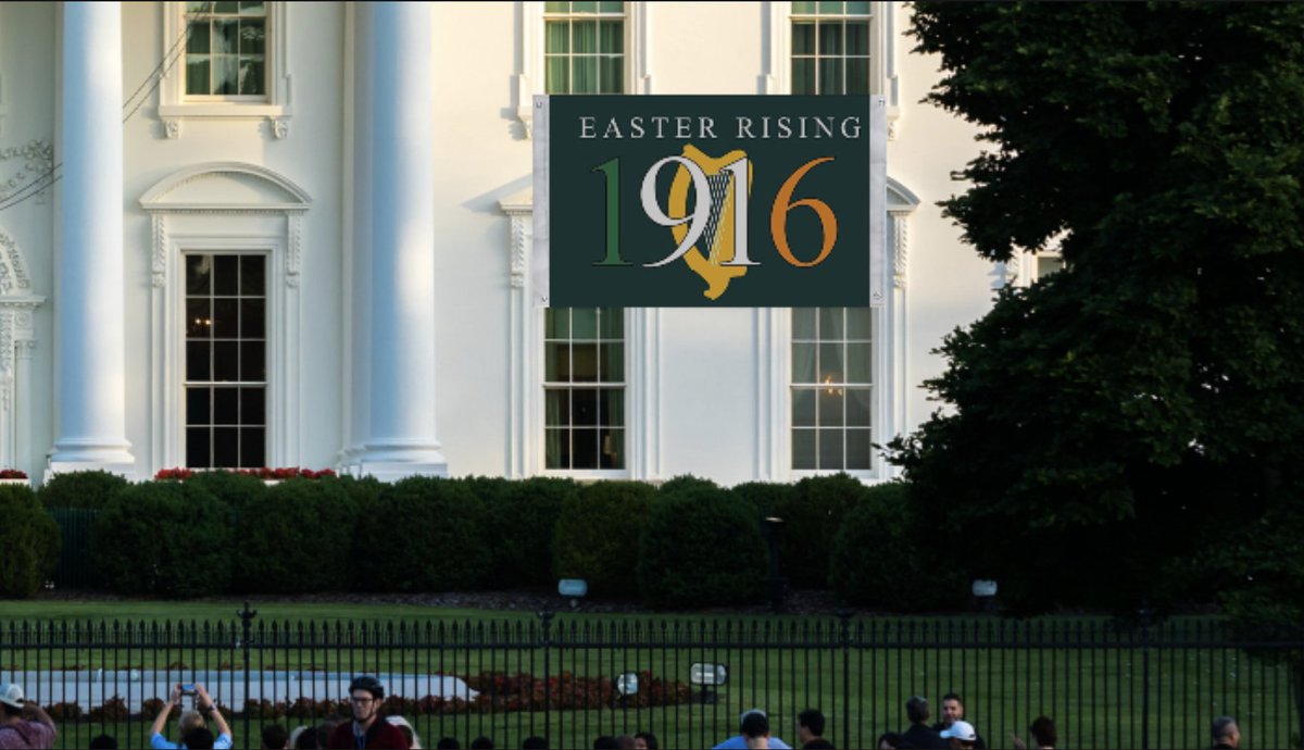BREAKING: President Biden hangs 'Easter Rising' sign out of White House window.