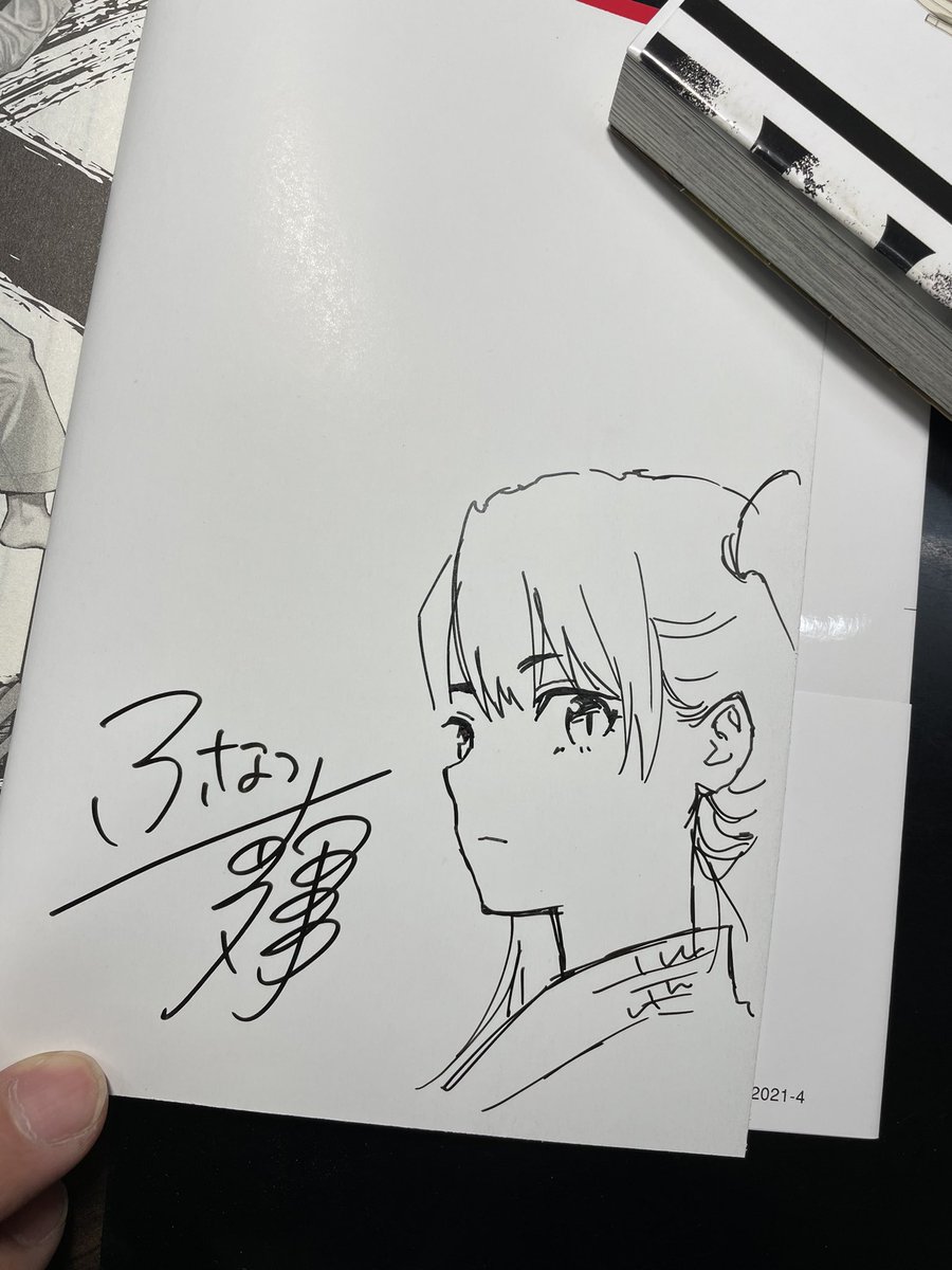 ギャラリー展で販売されるサイン本描いてる 