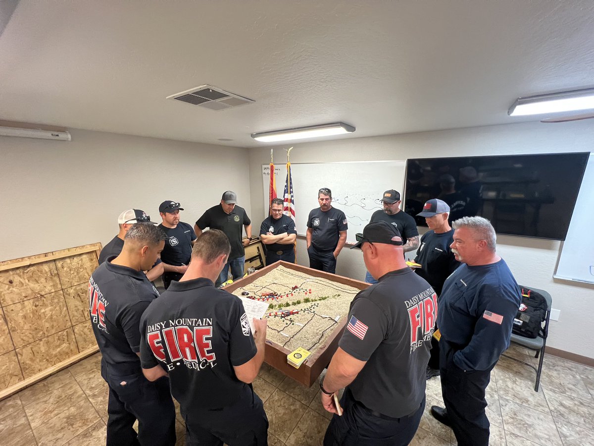DaisyMtnFire's tweet photo. Daisy Mountain firefighters teaming up with our  #AutomaticAid partners for wildland-urban interface sand table training. 

Please help us protect your home by creating a defensible space of at least 30 feet. A little work now can save you big later. https://t.co/ZfKQgjF352